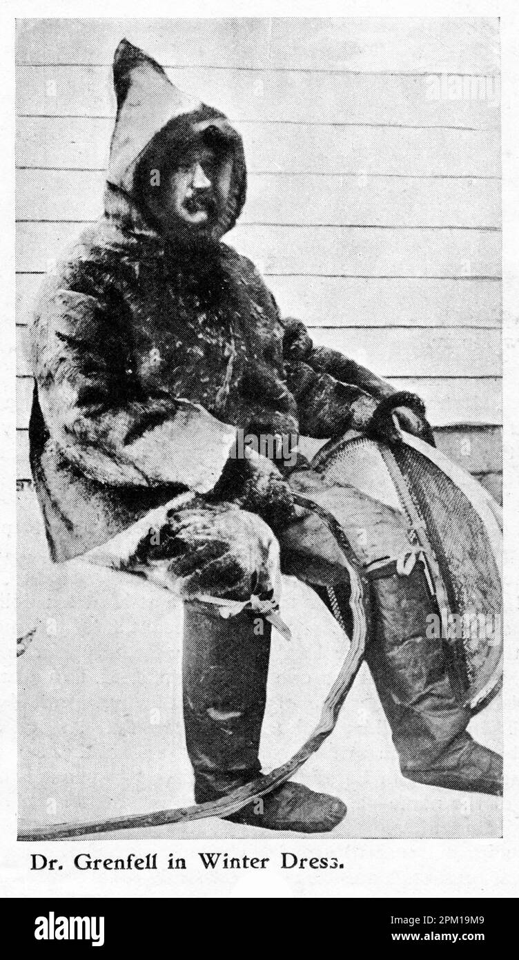 Portrait of Doctor Wilfred Grenfell, pioneer of medical services in Newfoundland, kitted out in winter clothing and ready to pick up patients with his team of sled dogs Stock Photo