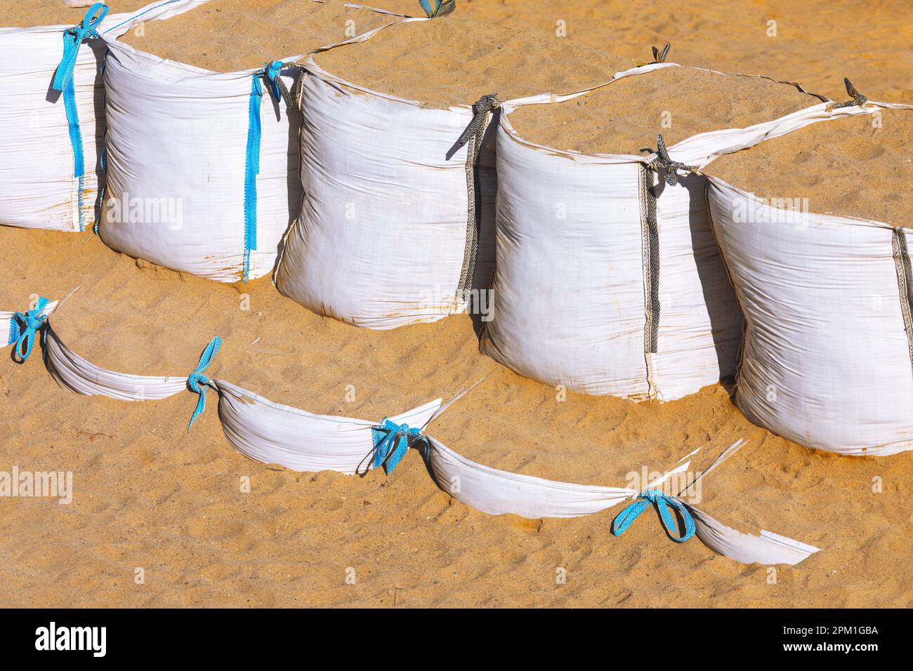 Sand bags on the beach . Sandy bag dam Stock Photo Alamy