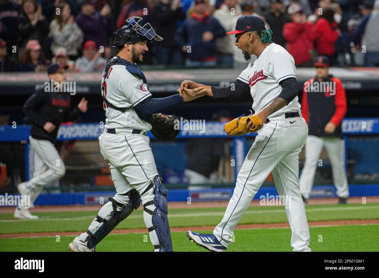Cleveland Guardians' catcher Mike Zunino congratulates reliever