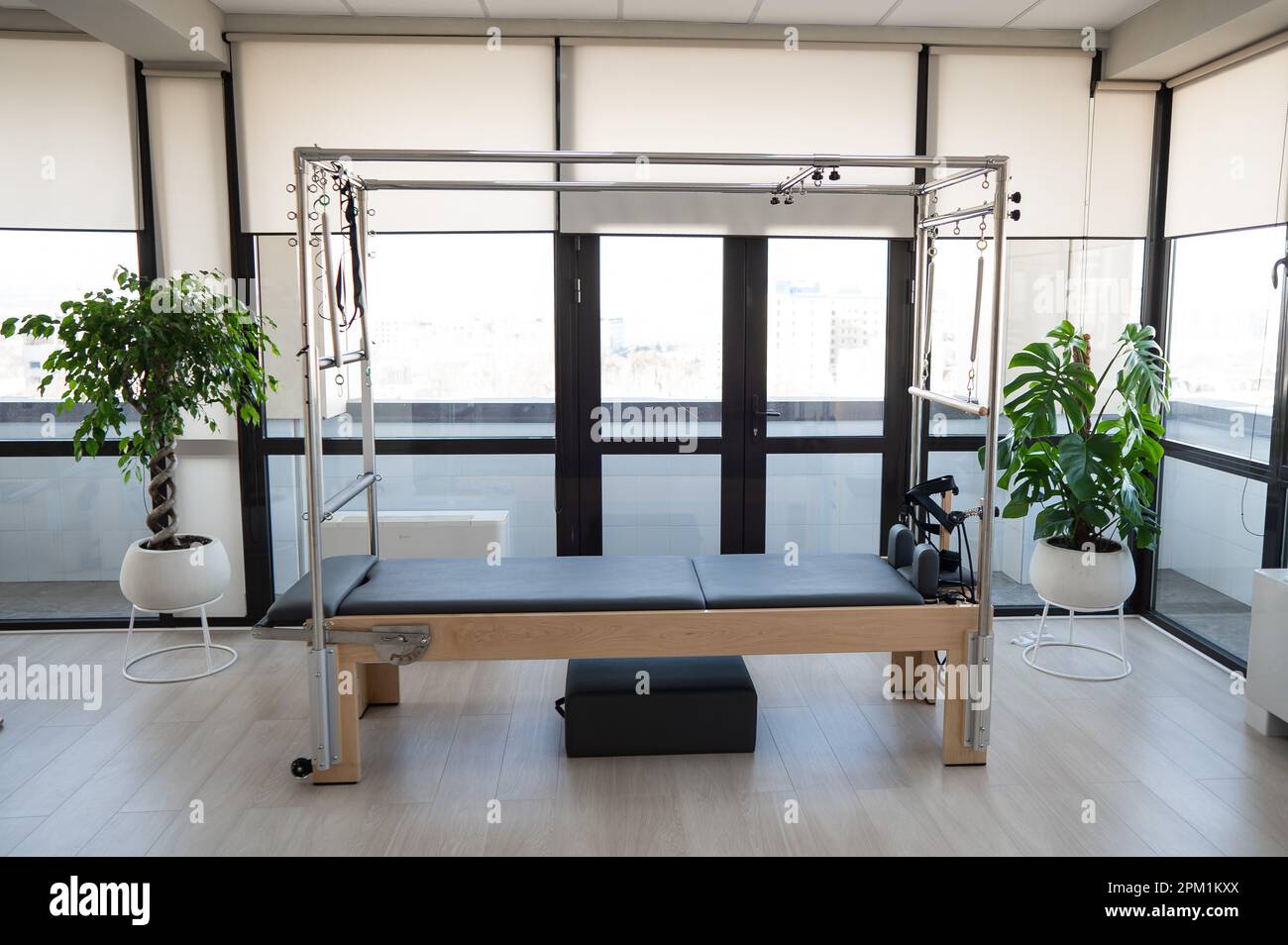 Machine reformer. Pilates studio without people Stock Photo Alamy