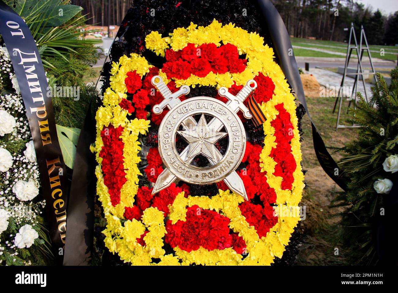 A funeral wreath is left at the grave of Vladlen Tatarsky at Troyekurovskoye cemetery in Moscow. Maxim Fomin better known by his pen-name Vladlen Tatarsky was a convicted criminal who escaped from prison and made a name for himself as a Ukrainian-born Russian military blogger and a participant in the war between Russian and Ukraine. He was active as a propagandist for the Russian side in the war until he was murdered in a terrorist act in St. Petersburg on April 2, 2023. 26-year-old woman named Darya Trepova was arrested for the bombing that had killed Tatarsky and injured dozens of others. Stock Photo