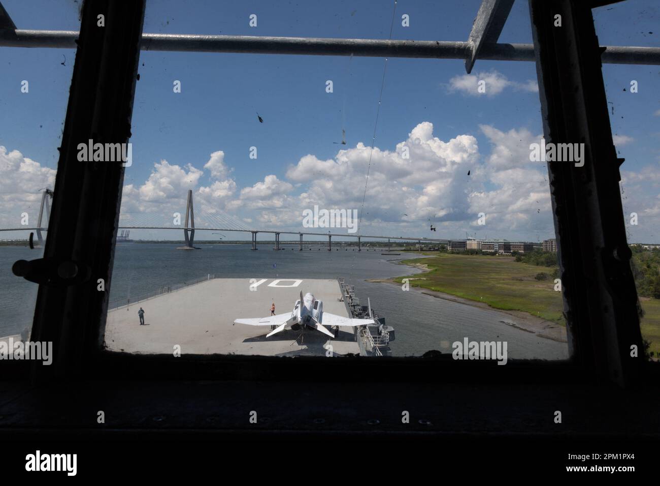 A McDonnell Douglas F-4 fighter jet seen from the helm of the USS Yorktown at Patriot's Point Naval and Maritime Museum in Mount Pleasant, SC, USA. Stock Photo