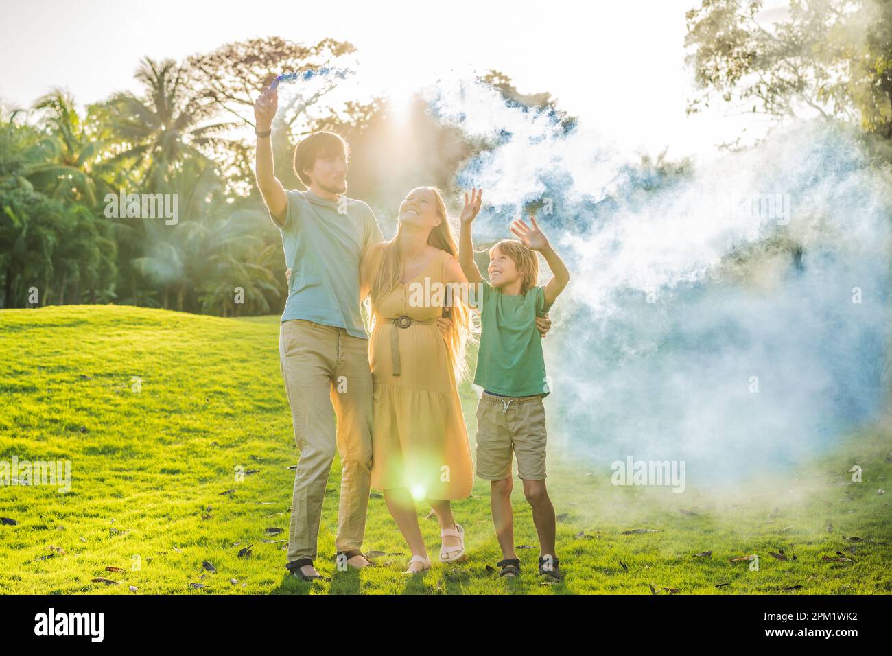 Pregnant mom, dad and son at the gender party on the golf course ...