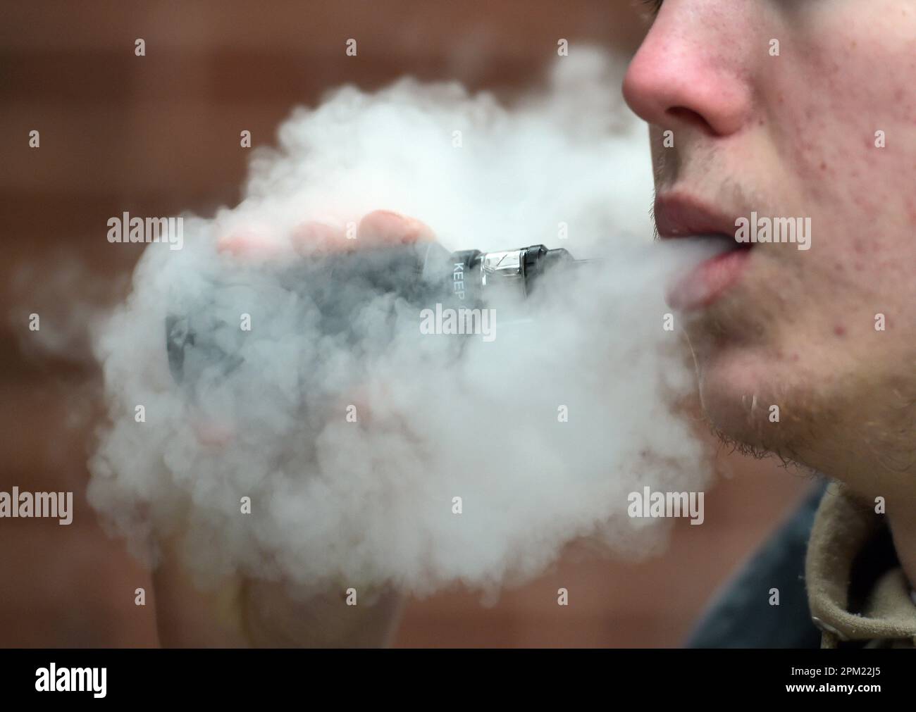 File photo dated 21/02/20 of a man vaping. One million smokers will be  encouraged to swap cigarettes for vapes under a "swap to stop" scheme  described by ministers as a world first.