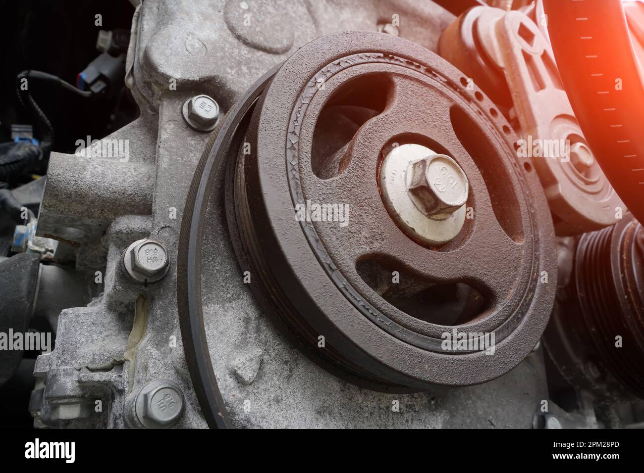 car engine closeup, crankshaft pulley Stock Photo Alamy
