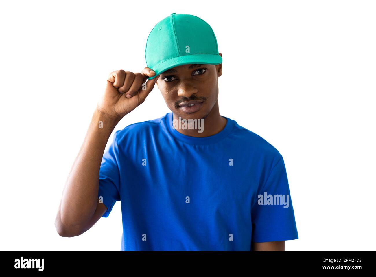 African american man wearing blue t-shirt and green cap with copy space on white background Stock Photo