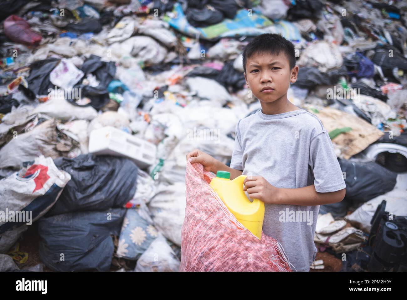 Children are forced to work on rubbish. Child labor, Poor children