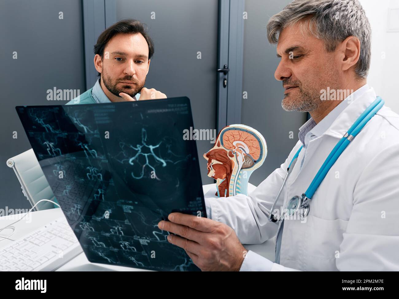 Consultation of neurologist in doctor's office in neurological clinic. Neurology, nervous system treatment Stock Photo