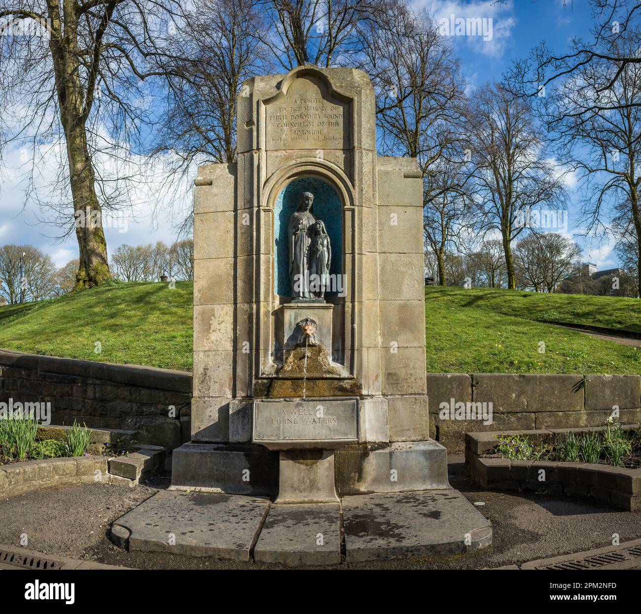 Fresh spring water running from the 'Well of living waters' in Buxton, Derbyshire. Stock Photo