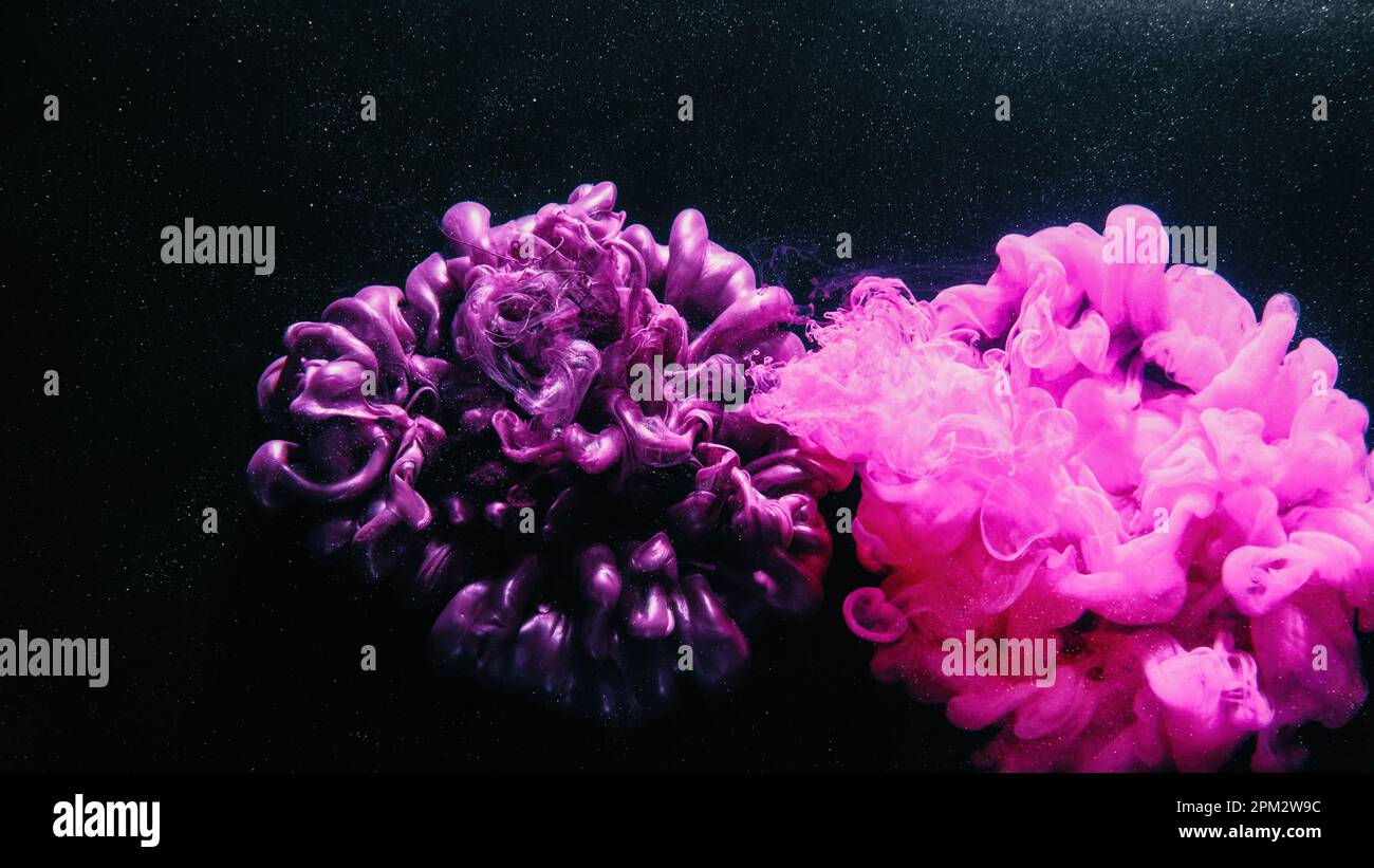 Paint drop ink water purple pink cloud particles Stock Photo - Alamy