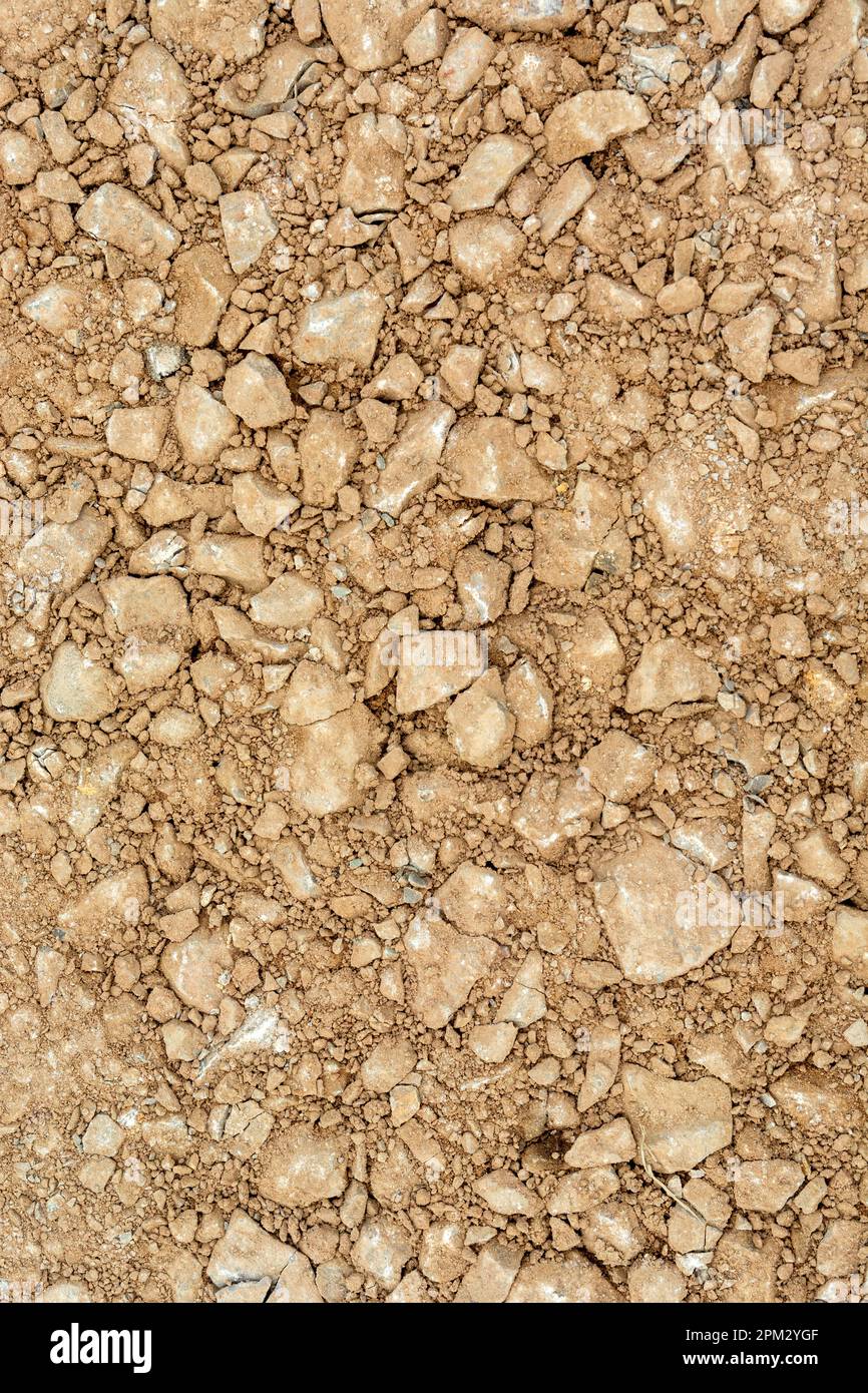 Red earth with stones, top view background Stock Photo