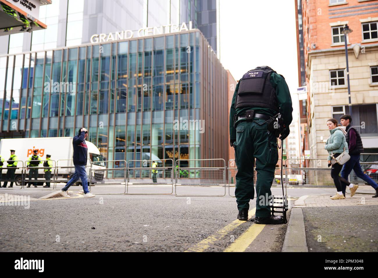A Police Officer From The TSG Demonstrates A Security Inspection Of A a-police-officer-from-the-tsg-demonstrates-a-security-inspection-of-a