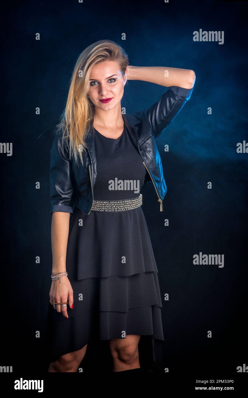 Beautiful woman in black jacket hi-res stock photography and images - Alamy
