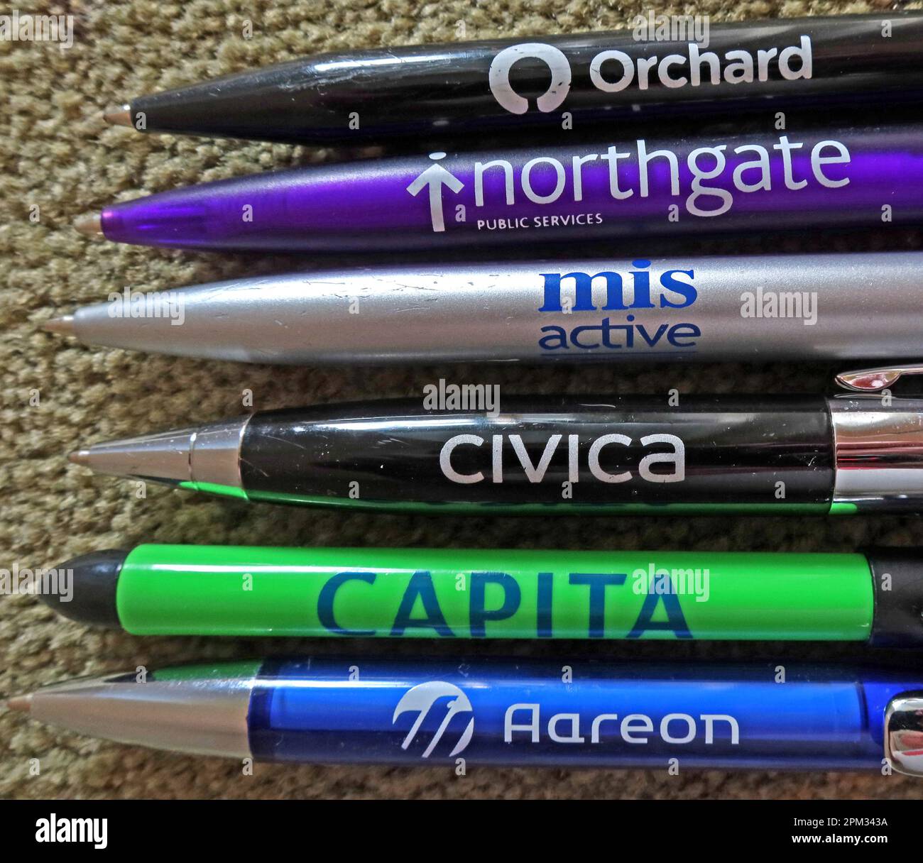 Freebie giveaway pens from UK and Irish Social Housing integrated HMS software and application suppliers - Aareon,Capita, Civica, NEC, Northgate, MRI Stock Photo