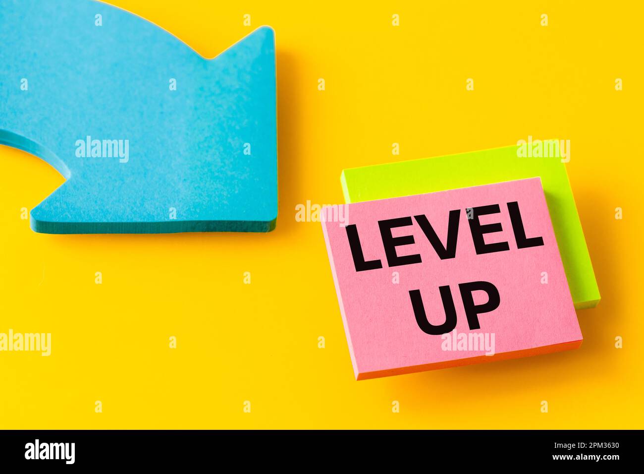 Level up, Written on colorful cards, Blue arrow points to target