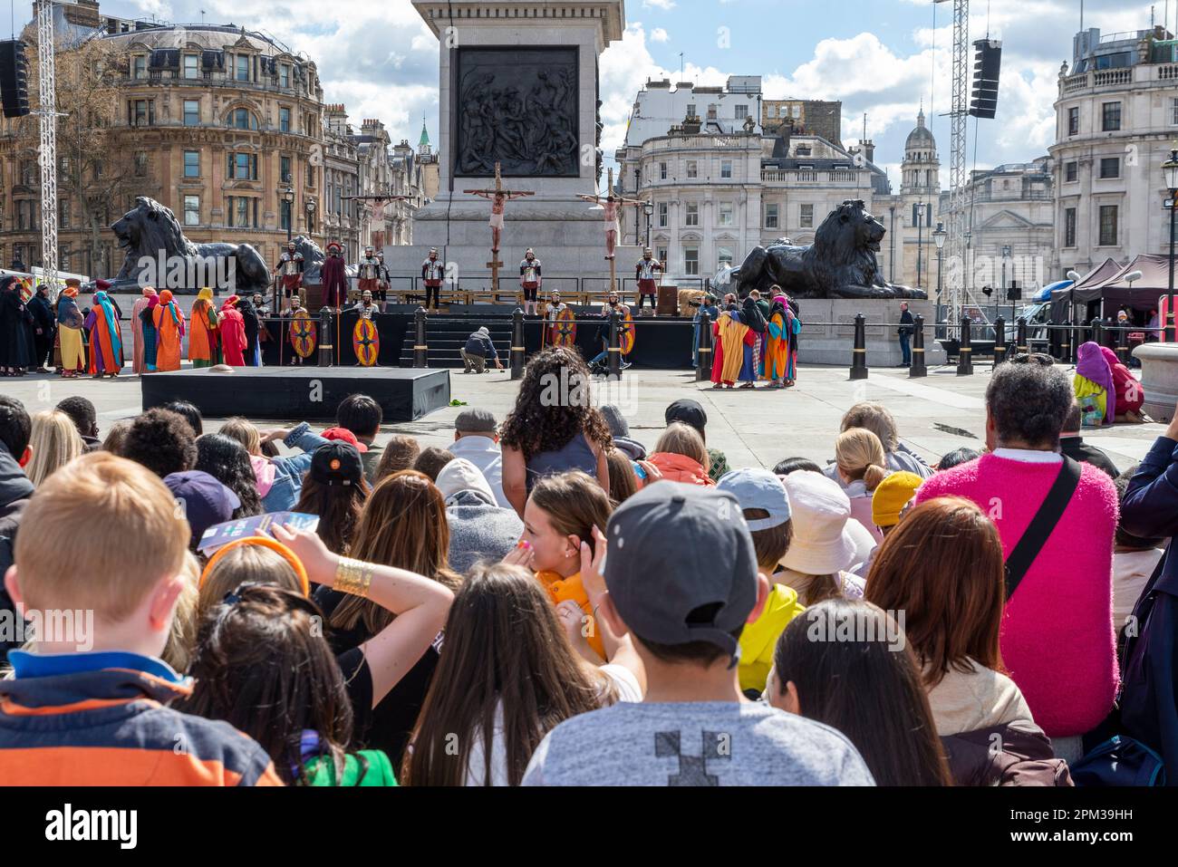 The Passion of Jesus open air play by Wintershall in Trafalgar Square, London, on Easter Good Friday. Audience watching actors portraying crucifixion Stock Photo