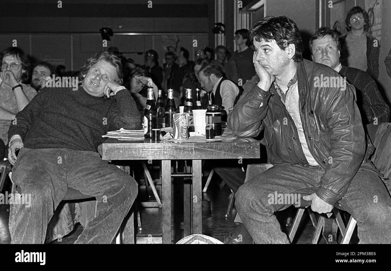 FILED - 21 February 1987, Frankfurt/Main: Joschka Fischer (r) and Daniel Cohn-Bendit (l) sit at the state delegates' meeting of the Hessian Greens in the Bergen-Enkheim district of Frankfurt. Fischer, who was the spokesman for the Alliance 90/The Greens parliamentary group in the German Bundestag from 1994 to 1998, and Germany's foreign minister and vice chancellor from 1998 to 2005, was born in Gerabronn in Baden-Württemberg on April 12, 1948. Photo: Frank Kleefeldt/dpa Stock Photo