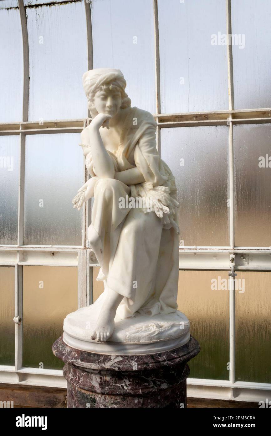 Sculpture of Ruth by Milanese sculptor, Giovanni Ciniselli, around 1880 within the Kibble Palace in the Glasgow Botanic Gardens, Glasgow, Scotland and Stock Photo