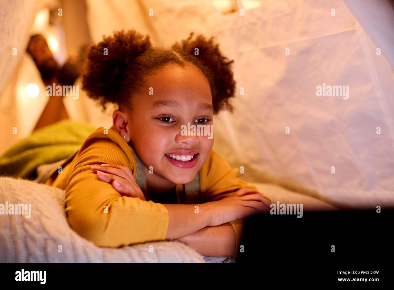 Black girl lying tent hi-res stock photography and images - Alamy