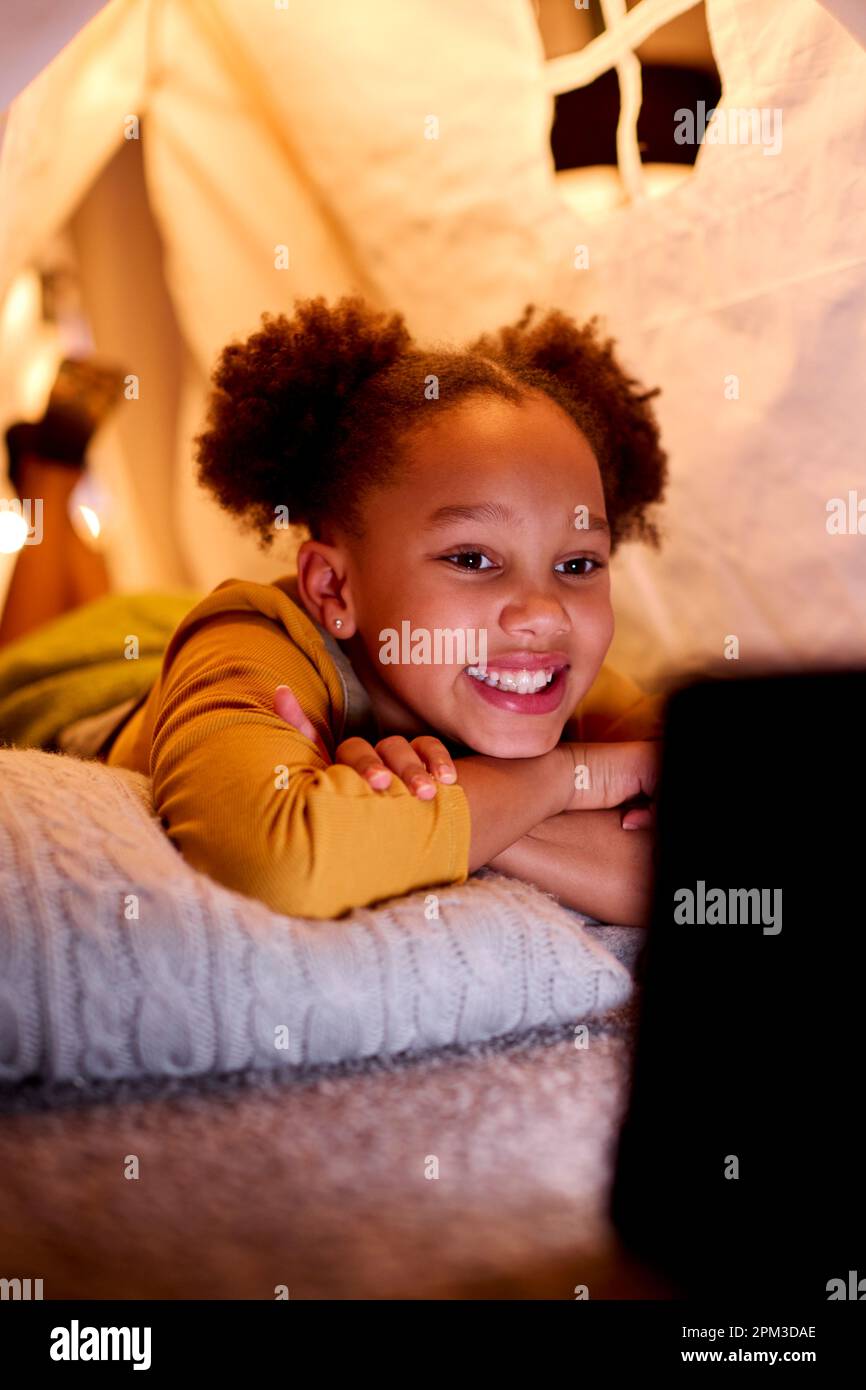 Black girl lying tent hi-res stock photography and images - Alamy
