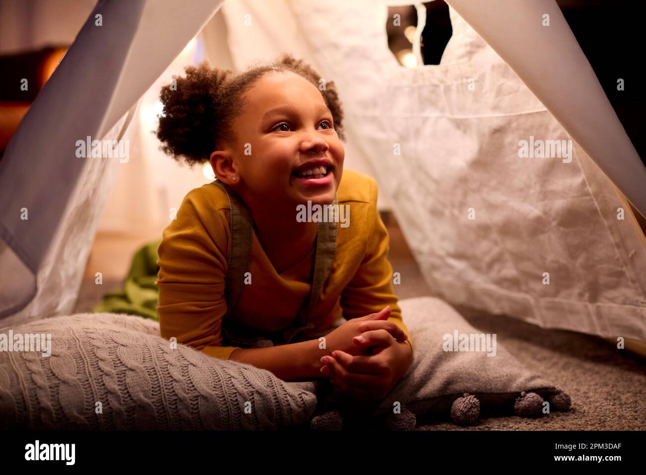 Black girl lying tent hi-res stock photography and images - Alamy