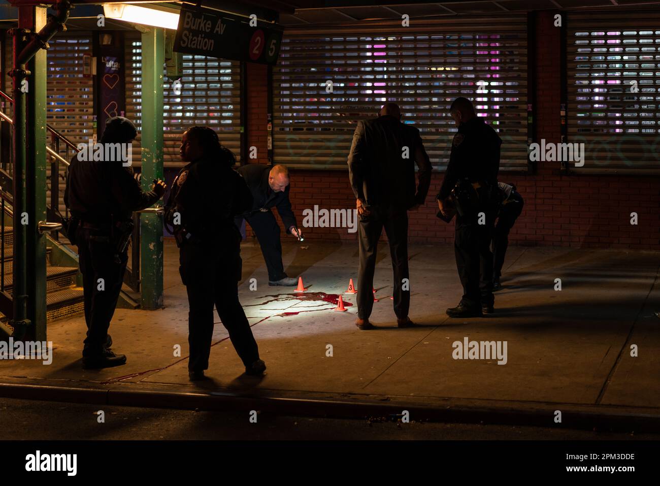 Crime scene unit investigate the scene where two teenagers were shot