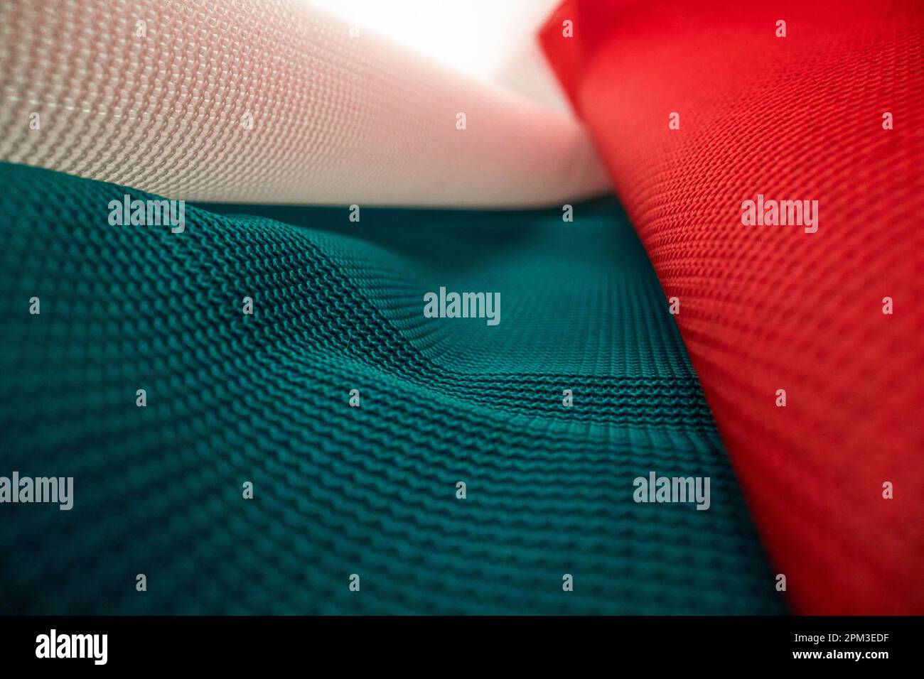 Macro view of the Italy flag material and its weaving pattern. Flag, country, patriotic Stock Photo