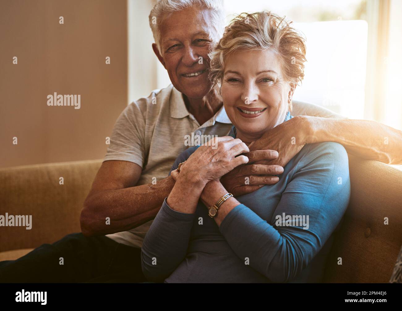 Our marriage just gets better with every passing year. Portrait of a senior couple relaxing together on the sofa at home. Stock Photo