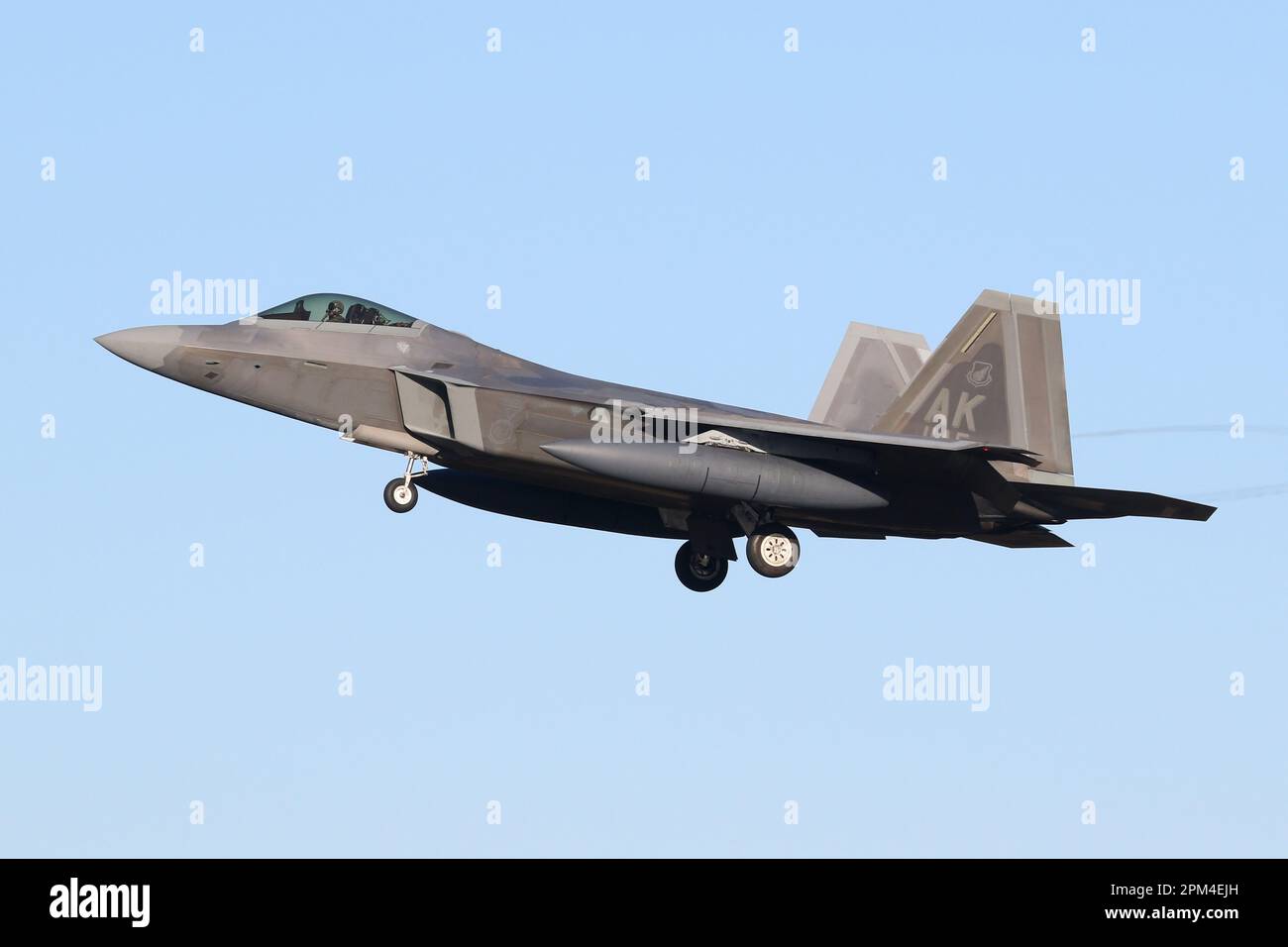 F-22A Raptor from the 3rd Fighter Wing at Elmendorf AFB in Alaska arriving at RAF Lakenheath enroute home following a European deployment. Stock Photo