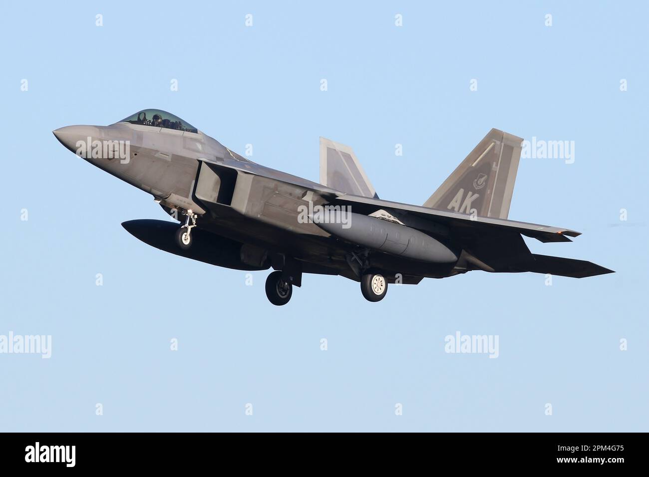F-22A Raptor from the 3rd Fighter Wing at Elmendorf AFB in Alaska arriving at RAF Lakenheath enroute home following a European deployment. Stock Photo