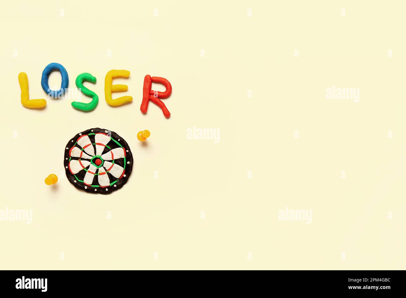 Word Loser Sticker Word LOSER with dartboard made of plasticine and pins on white ...