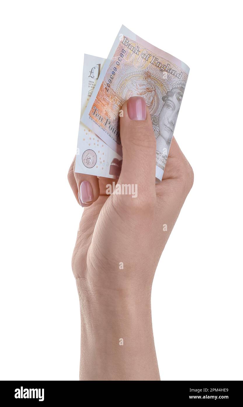 Woman with pound sterling banknote on white background Stock Photo - Alamy