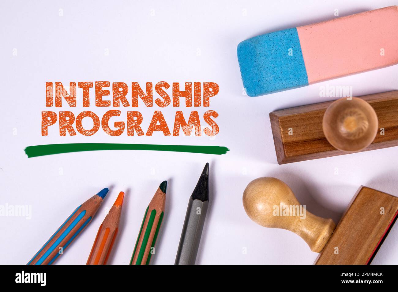 Internship Programs. Colored pencils, stamps and eraser on a white