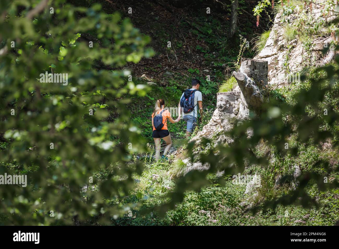 Couple young hikers backpacks hi-res stock photography and images - Alamy