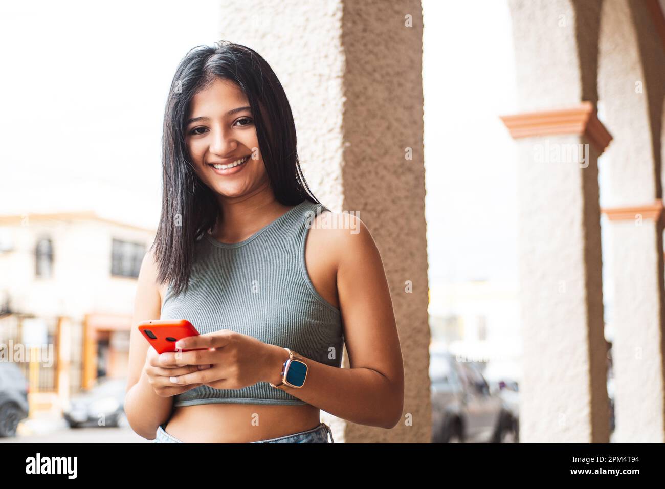 Young woman latin city hi-res stock photography and images - Alamy