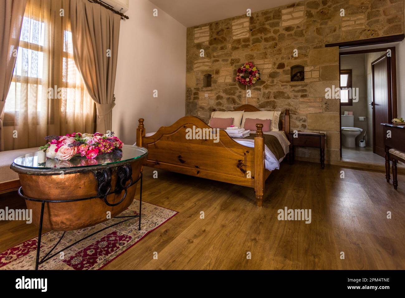 Rooms at Boutique Hotel Hanna Koumi in Kormakitis / Korucam, Cyprus. The house dates back to the 16th century Stock Photo