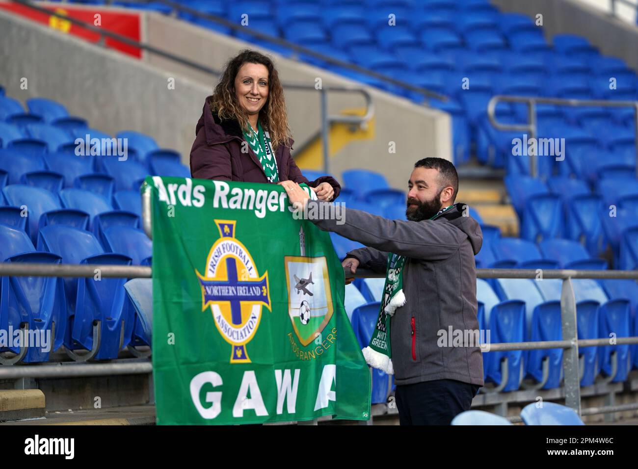 Irish football fans from Ards Rangers fly their flag before Wales 4 v 1 Northern Ireland, Cardiff City Stadium, 6th April 2023 Stock Photo