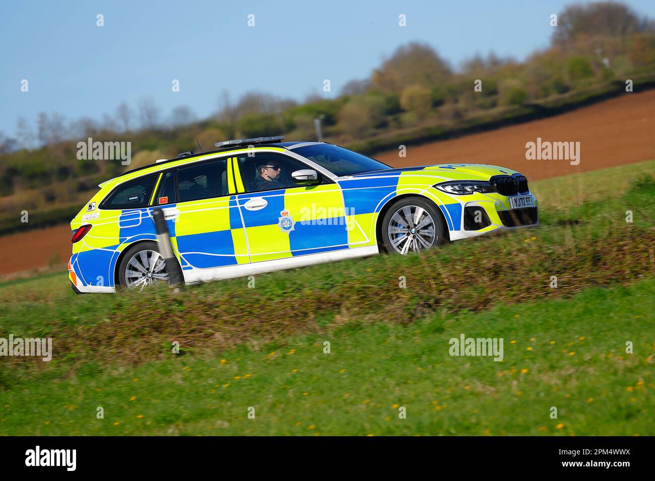 BMW police vehicle from North Yorkshire Police Force travelling along the B1222 near Newthorpe Stock Photo