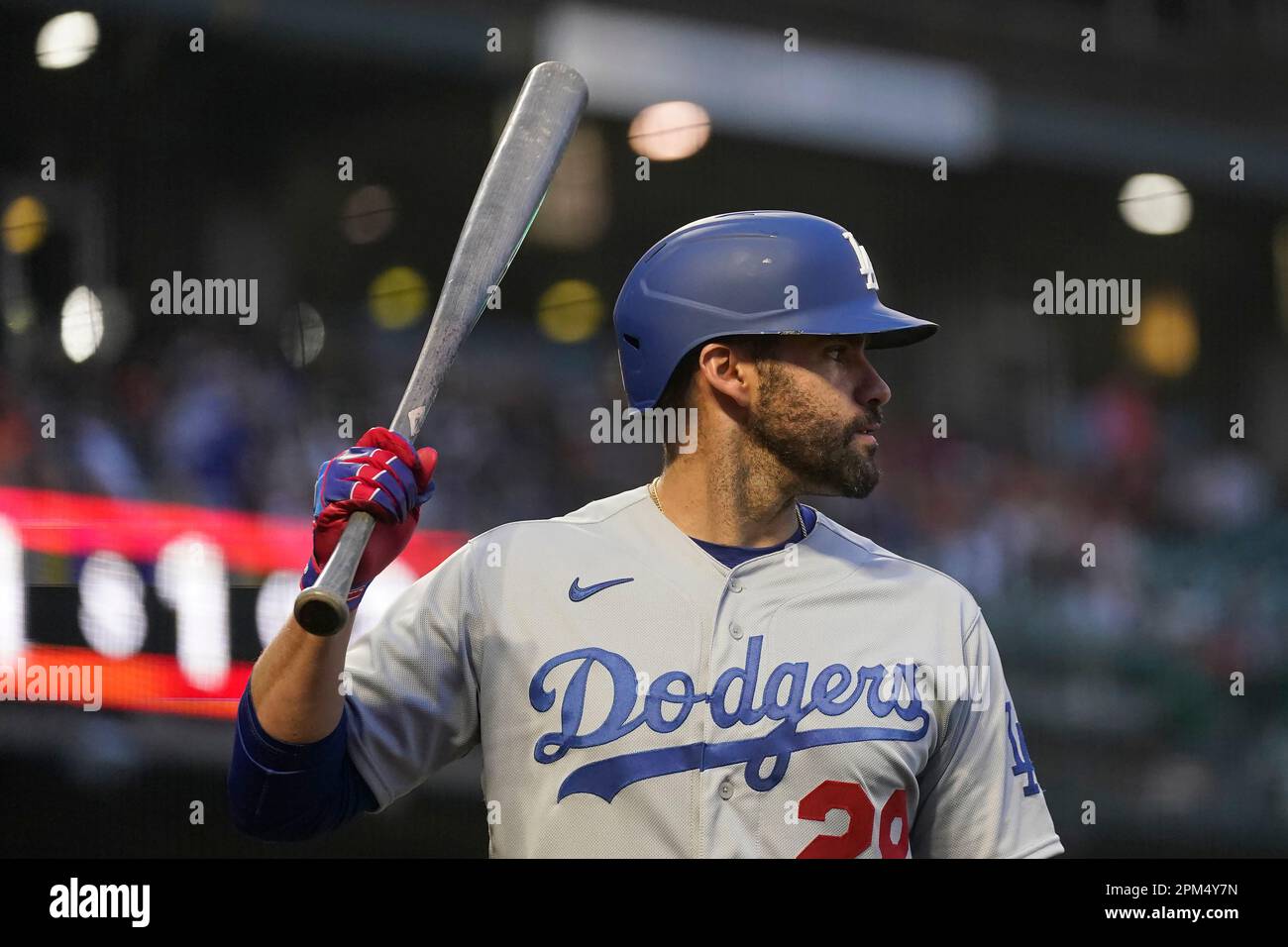 Los Angeles Dodgers' J.D. Martinez watches his three-run home run during  the sixth inning of a baseball game against the St. Louis Cardinals  Saturday, May 20, 2023, in St. Louis. (AP Photo/Jeff