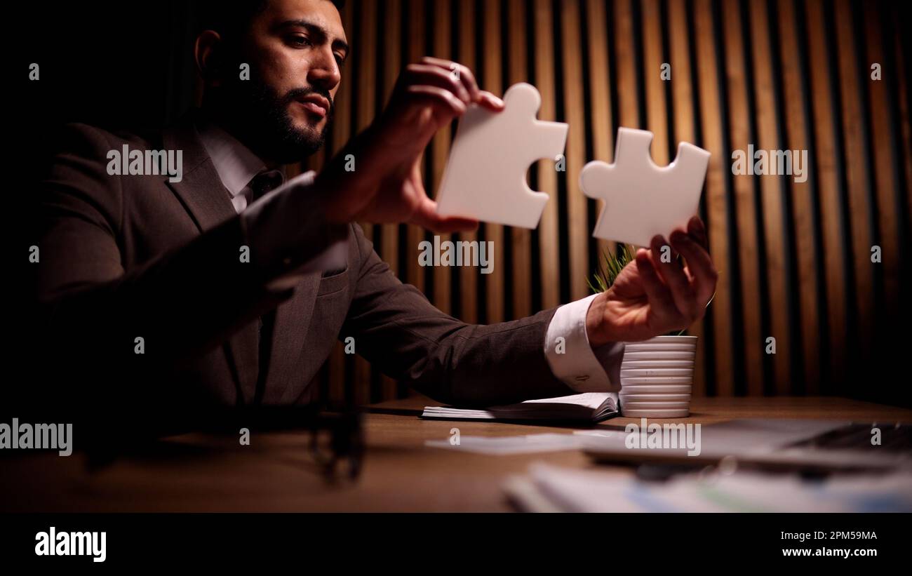 Attractive young guy is solving a problem Stock Photo