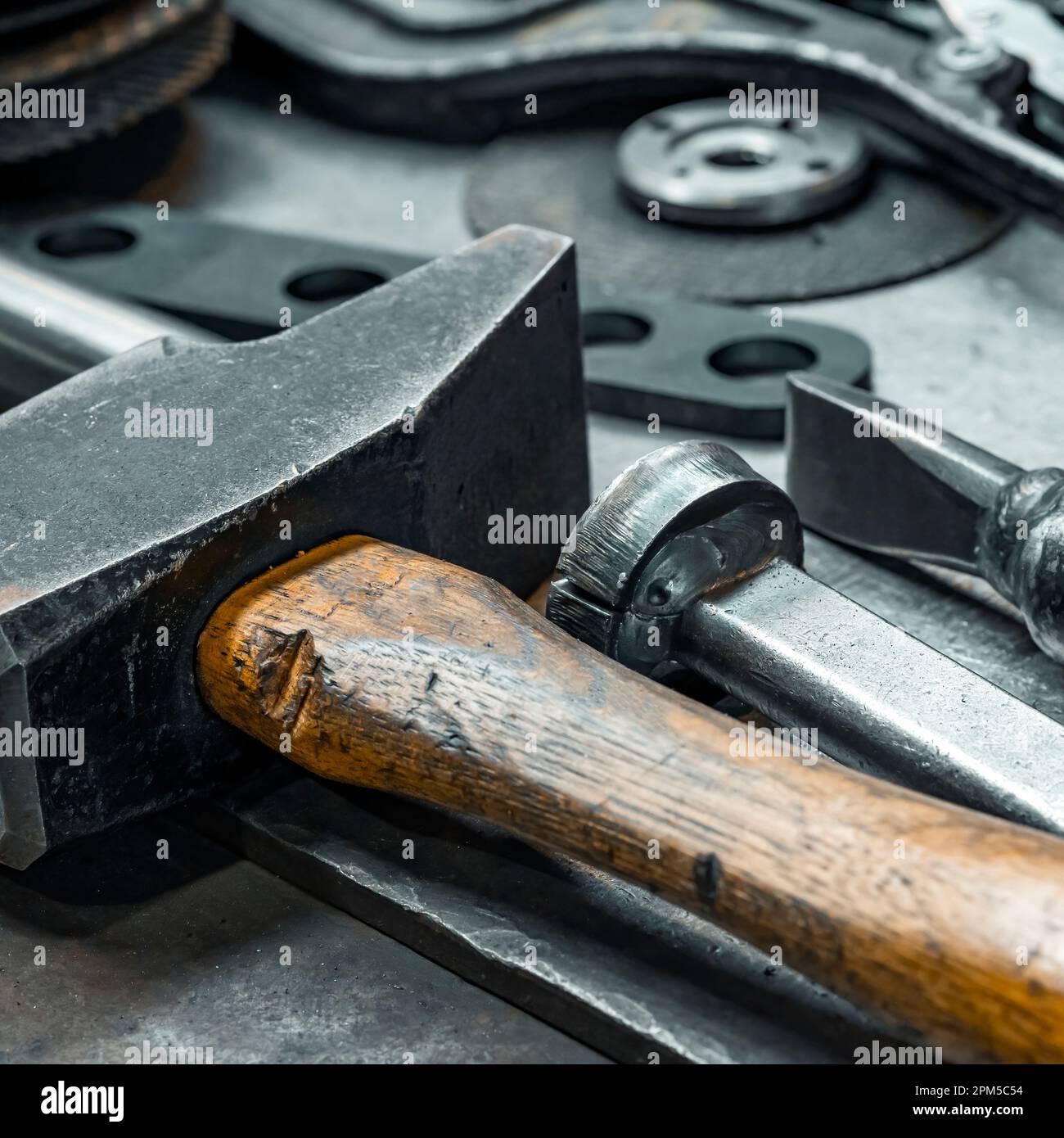Hammer in an industrial warehouse, France Stock Photo Alamy