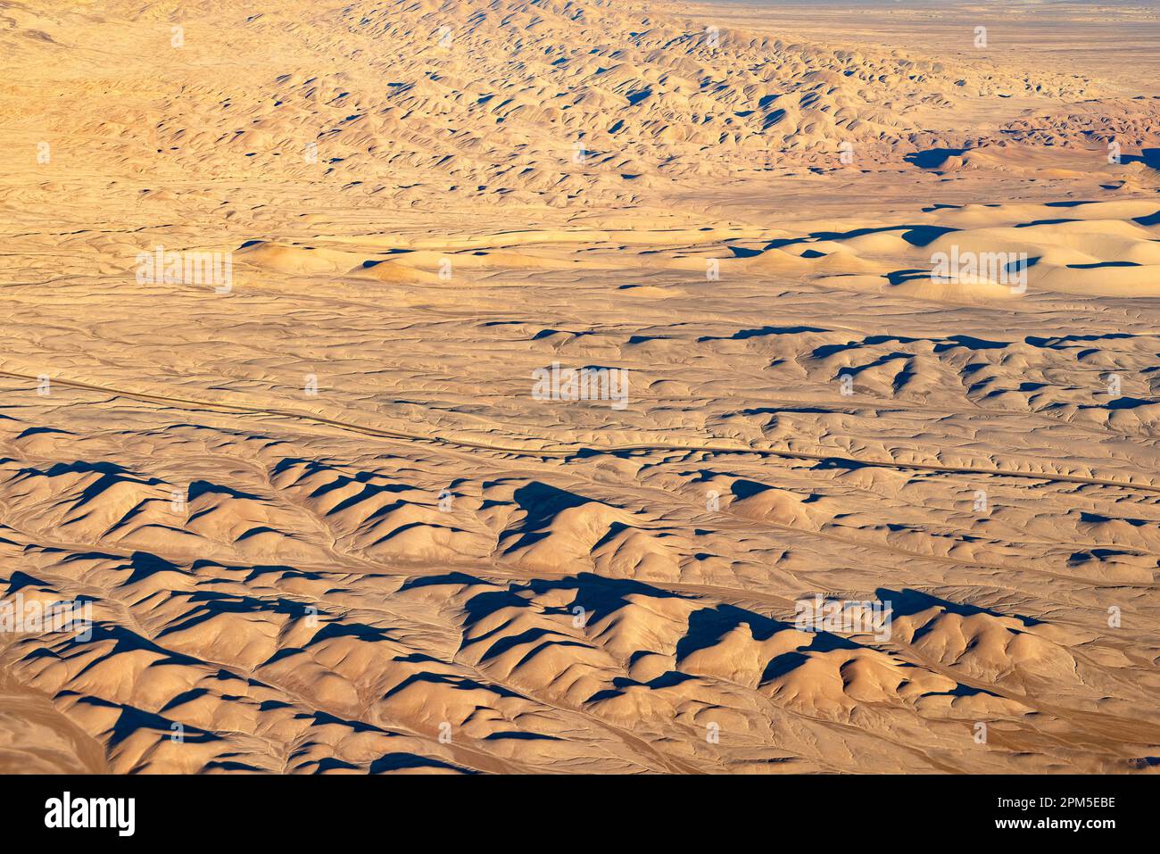 Aerial view of a road crossing the Atacama Desert, Chile Stock Photo