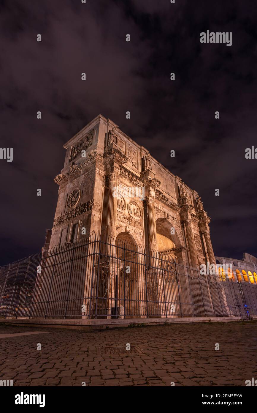 The Arch of Titus at night in Roman Forum, Rome Stock Photo