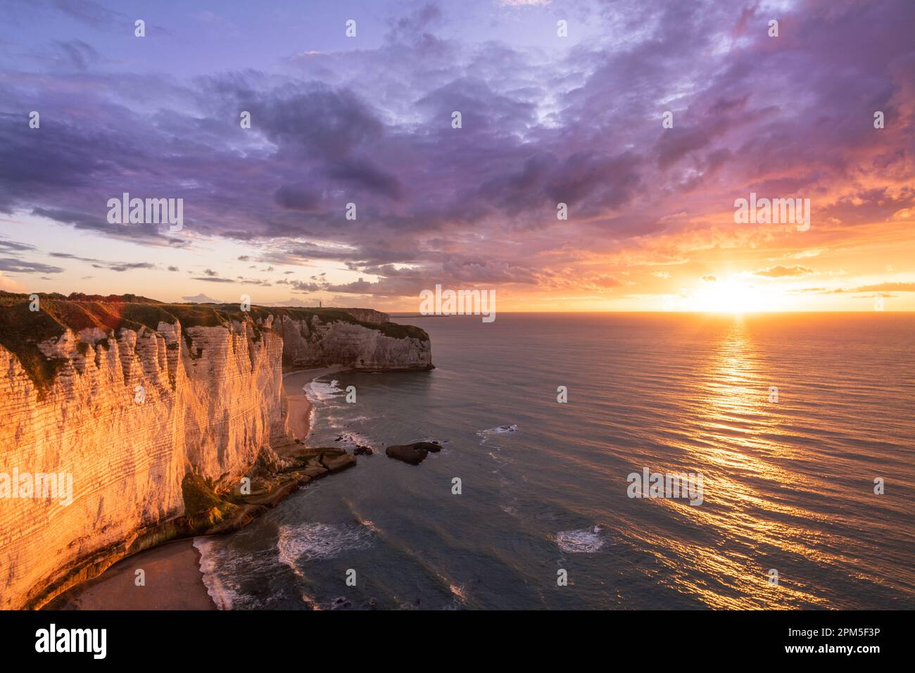 Incredible sunset on the cliffs of Etretat Stock Photo - Alamy