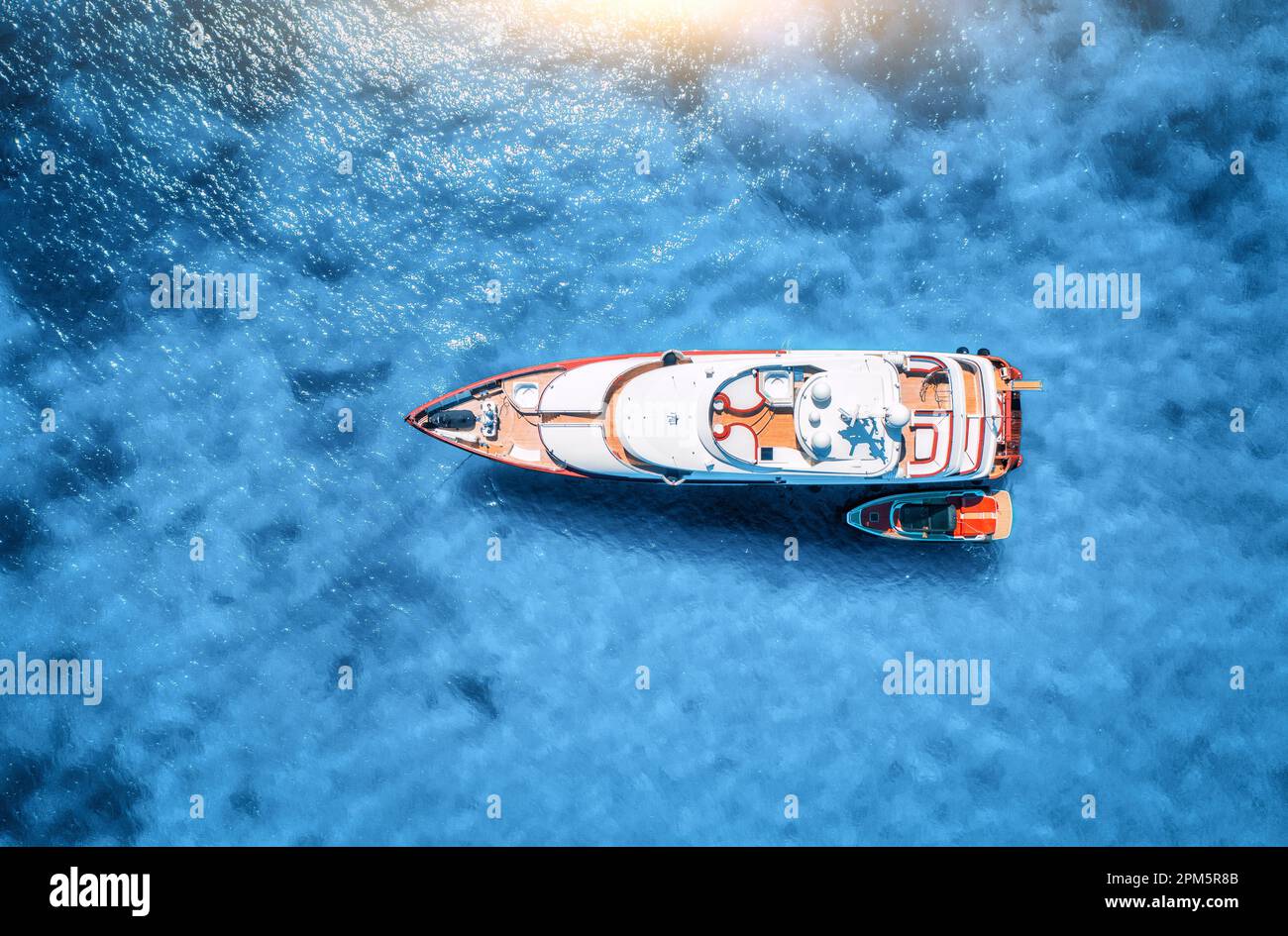 Aerial view of beautiful luxury yacht and boat in blue sea Stock Photo ...