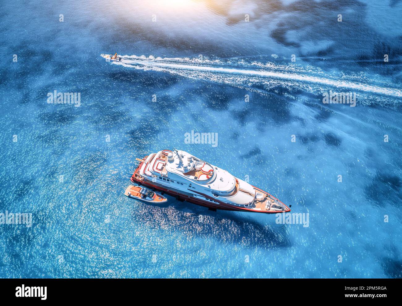Aerial view of beautiful luxury yacht and boat in blue sea Stock Photo ...