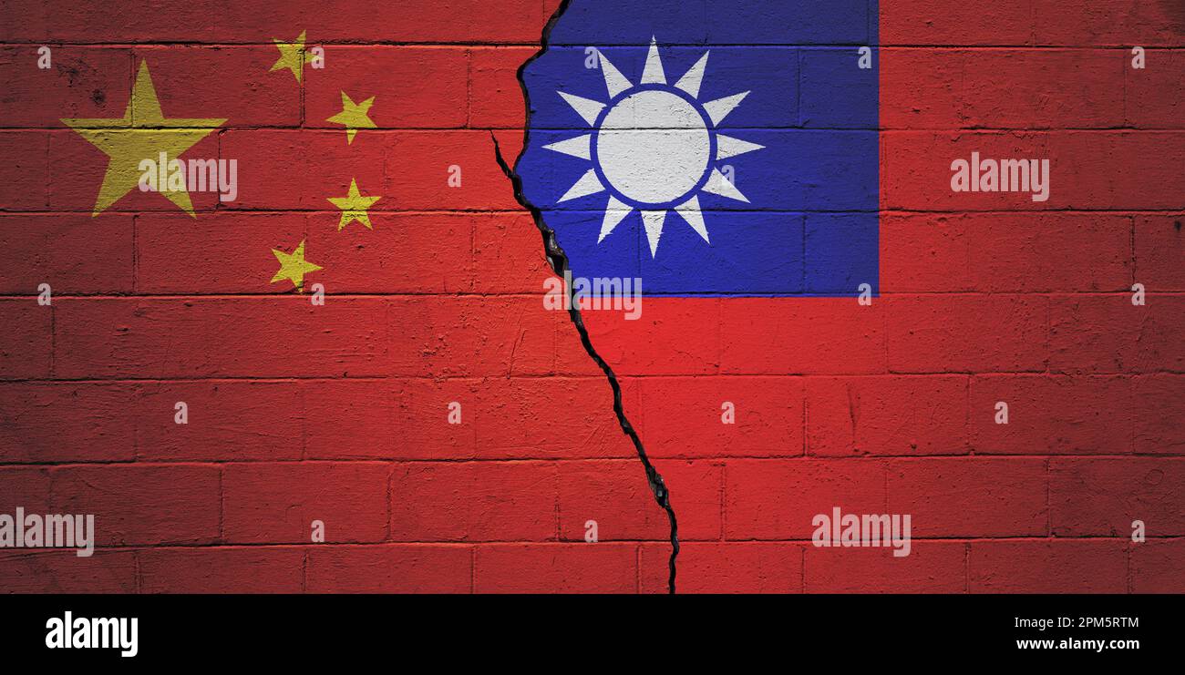 Cracked brick wall painted with an Chinese flag on the left and a ...
