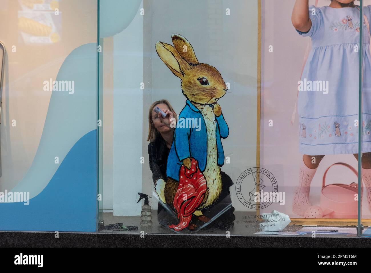 The World of Beatrix Potter shop window display being set up in a store ...