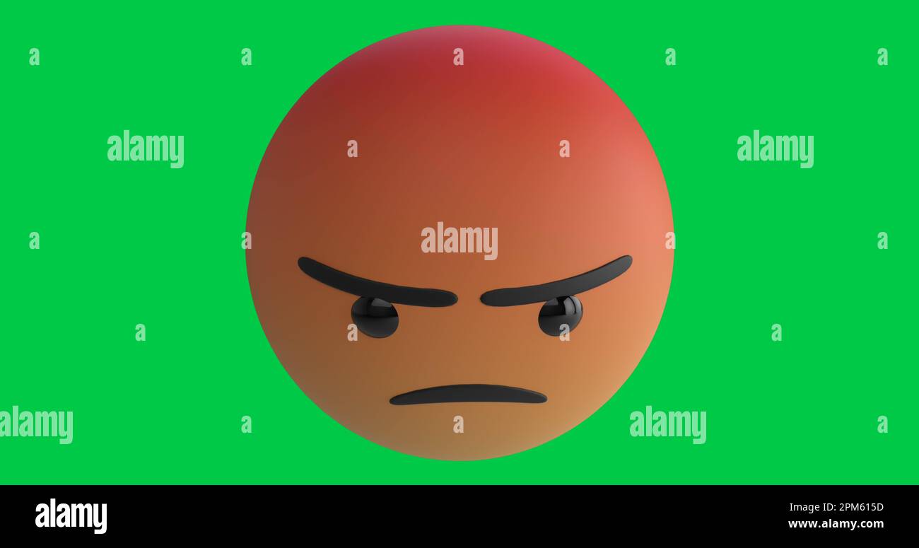 Composition of angry emoji icon on green background Stock Photo
