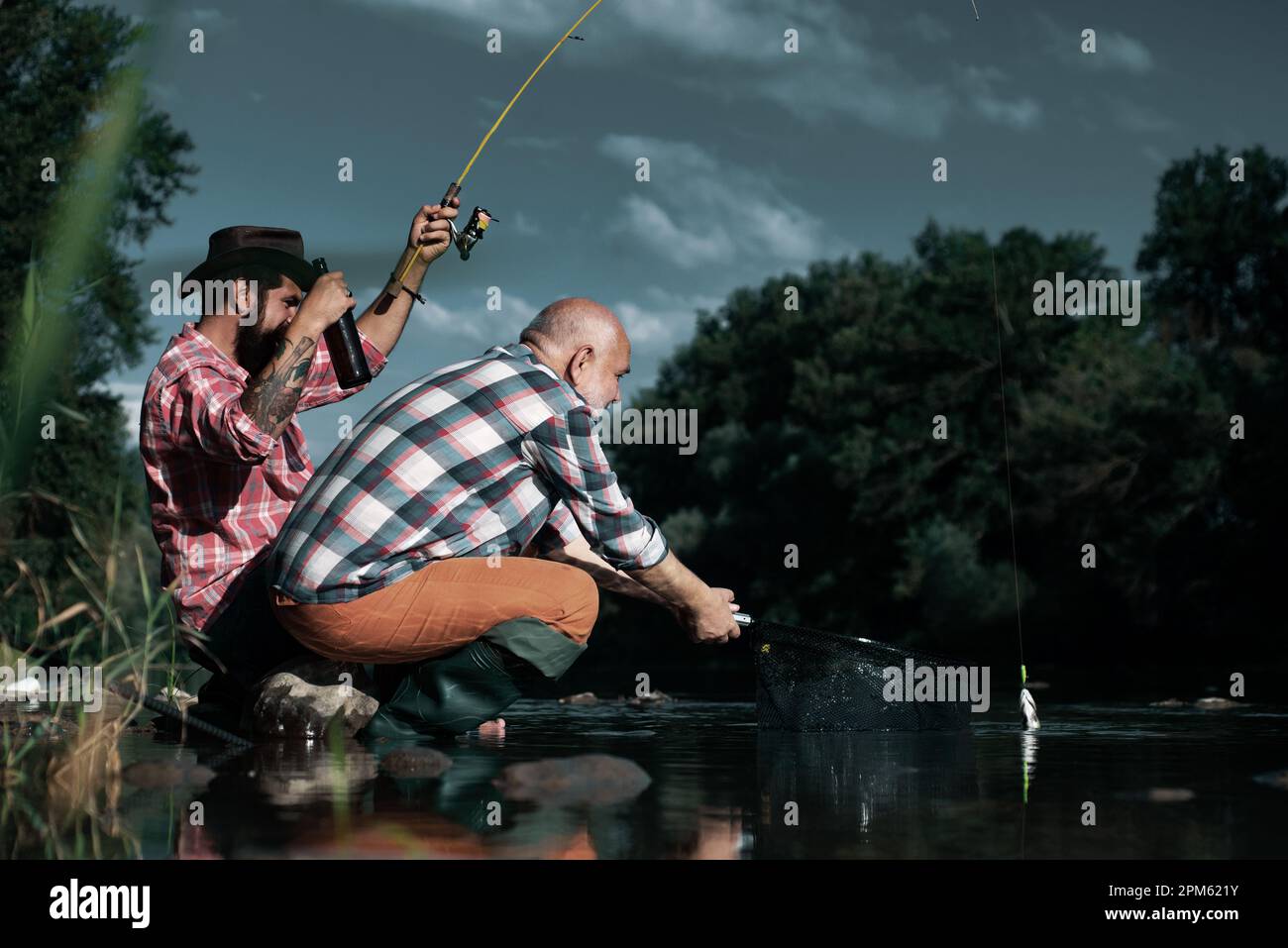 https://c8.alamy.com/comp/2PM621Y/nice-day-for-fishing-bearded-men-catching-fish-off-limits-fishing-fishermen-fishing-equipment-fisher-fishing-equipment-catch-me-if-you-can-2PM621Y.jpg